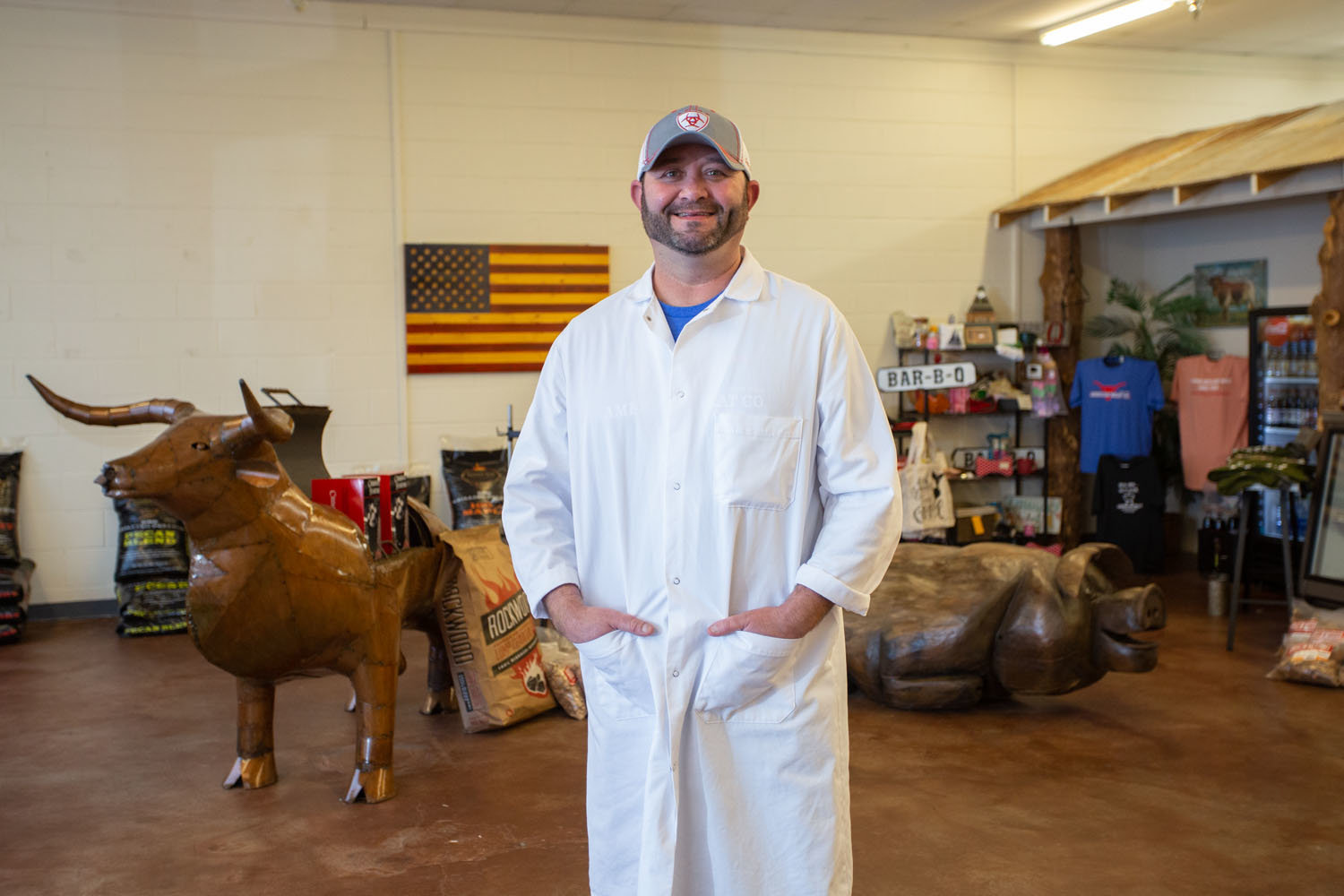 A PLACE TO MEAT: Jason Owen leads a small staff at American Meat Co., succeeding his father seven years ago as owner of the butcher shop.